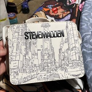 Steve Madden New York bag with wristlet.